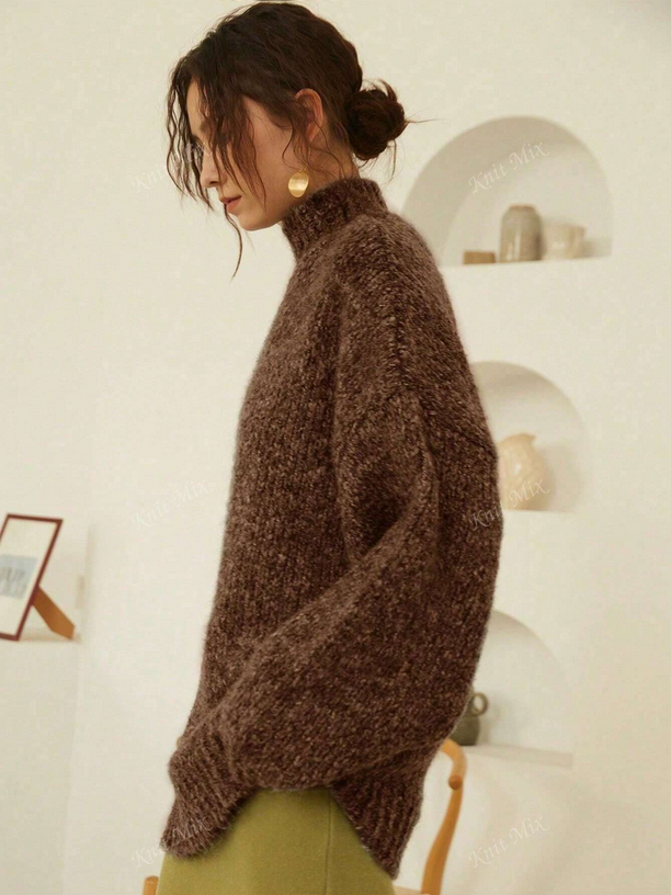 Woman wearing a brown sweater in a room with white walls and shelves.