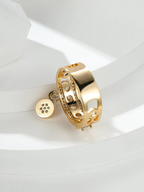 Gold earring on a white background