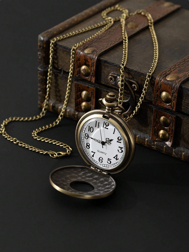 Vintage pocket watch with chain on a dark background