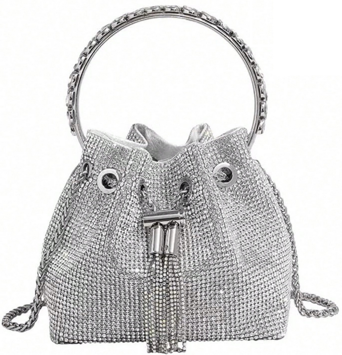Silver handbag with rhinestone details on a white background